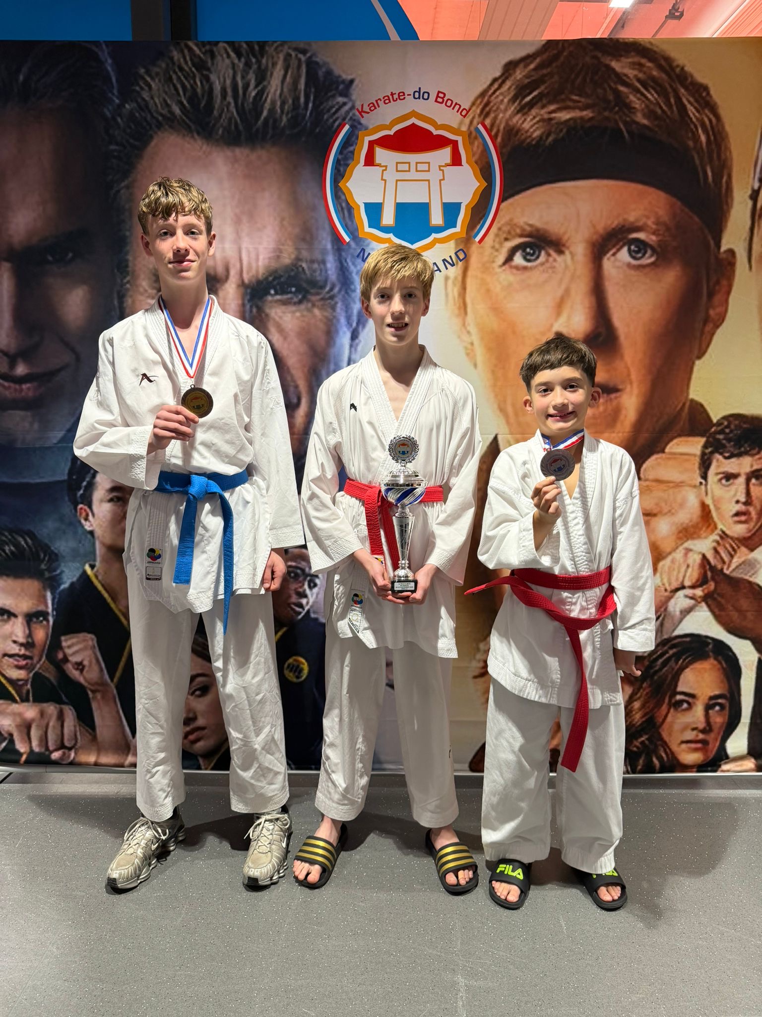 Reinier Essers, samen met Julian Zelissen en Jesaja Gotwalt op het erepodium.